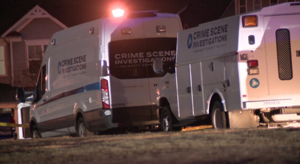 Four family members were found shot to death inside a Lawrenceville home early Friday after a child inside the house called police to report gunfire