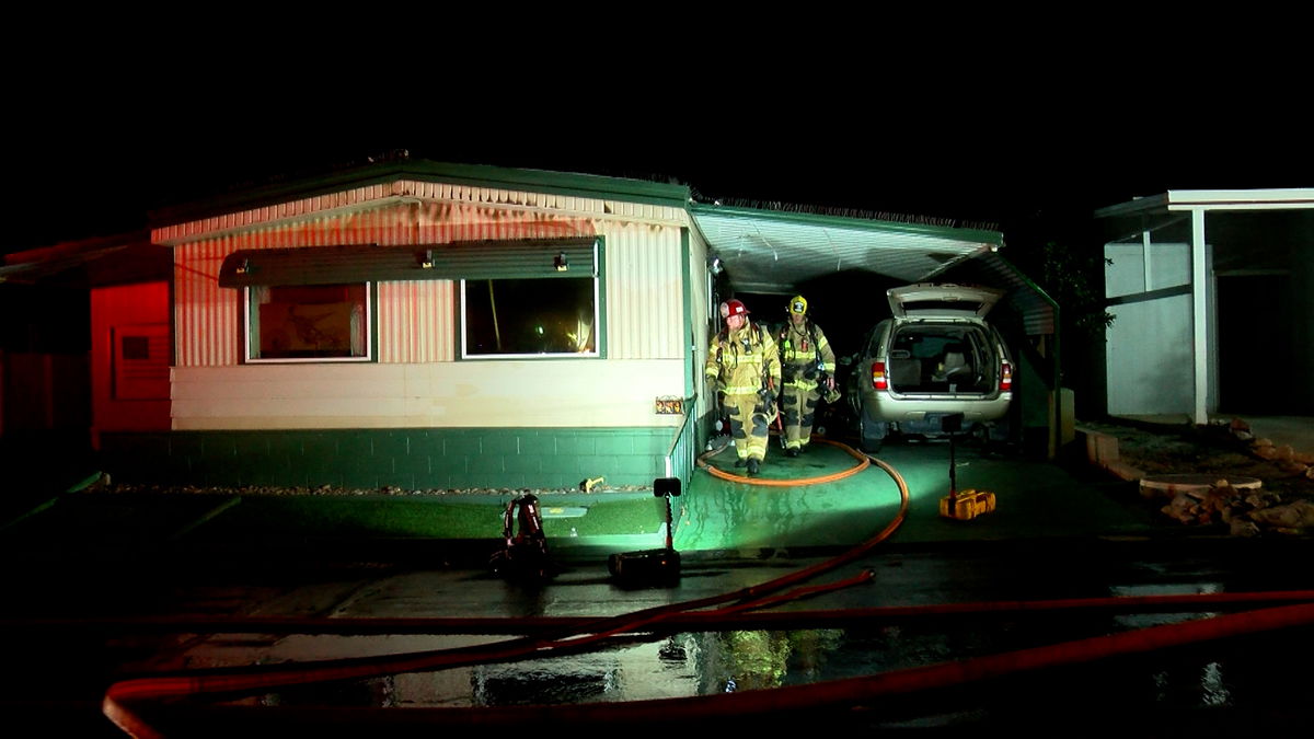 Two injured after fire at mobile home in Desert Edge