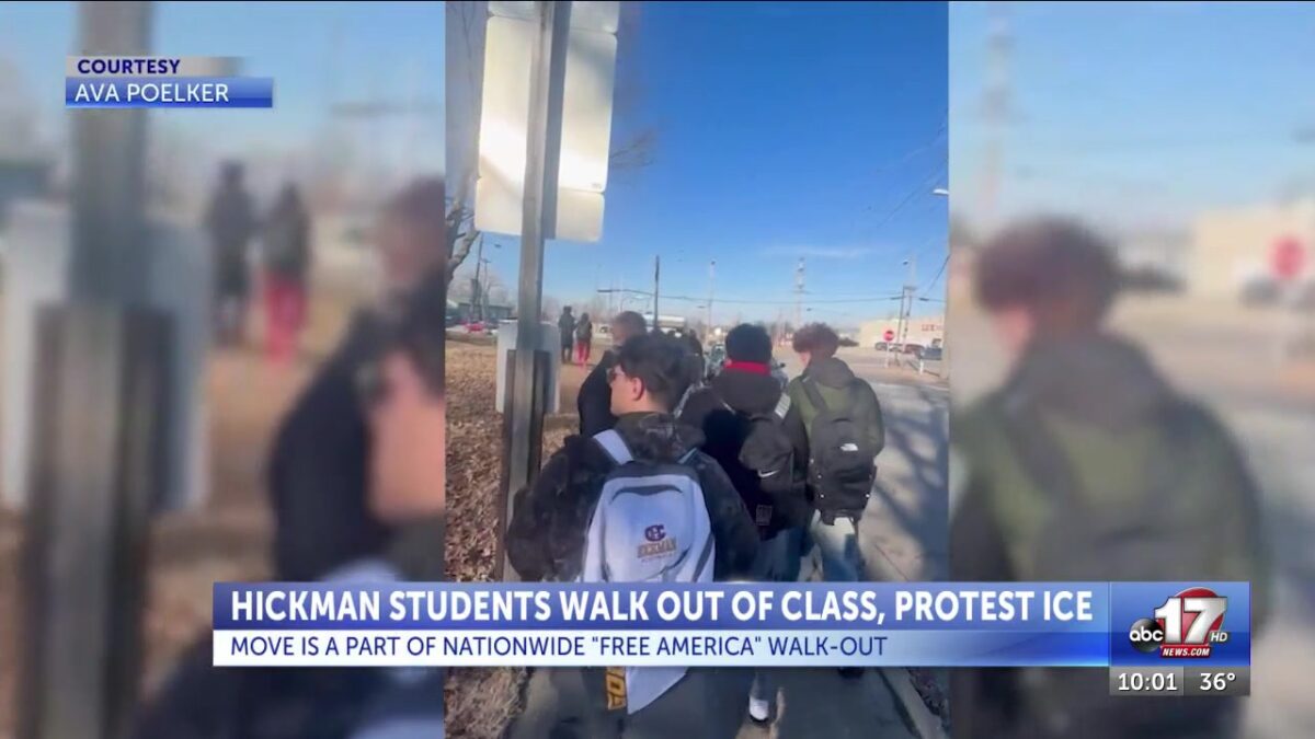 Hickman High School students walk out Tuesday in protest against ICE