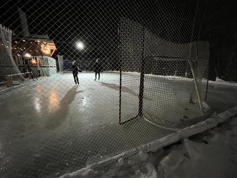 The Howell family builds a hockey rink in their backyard every year.