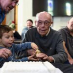 103-year-old Dearborn resident and WWII vet honored with biography in milestone birthday celebration