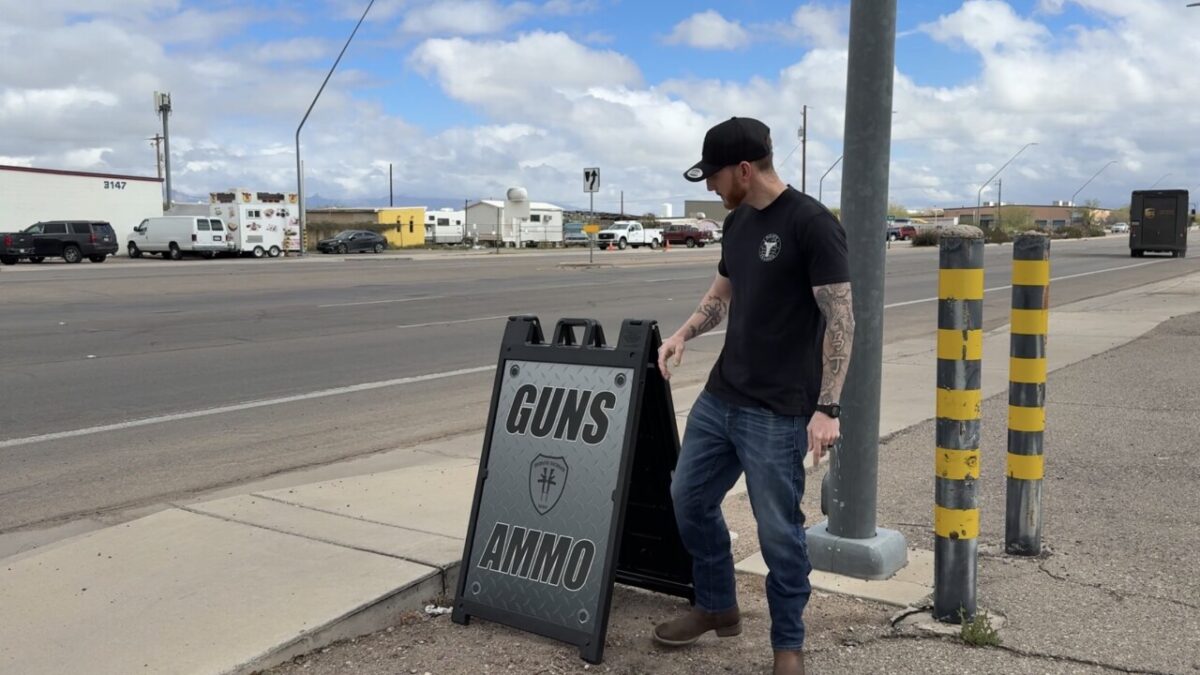 Gun shop owner says FBI agent asked if he sold a gun to anyone on a list he produced.