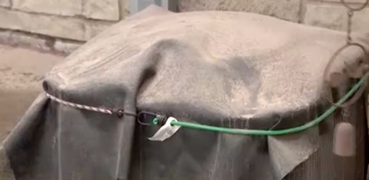 A Port Washington couple is dealing with near-constant mud and dust covering their home along Highway LL