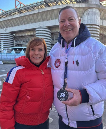 Everen Brown is given a medal to celebrate his Olympic dedication.