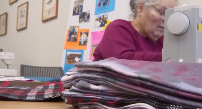 A group of women in Iowa is changing lives by sewing personal hygiene kits for South African girls