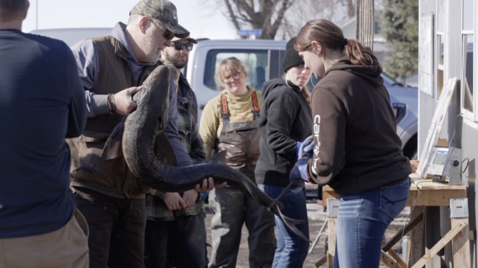 Father and son Brent and Craig Shepherd from Quinney landed the biggest fish of the day — a 108-pound sturgeon.