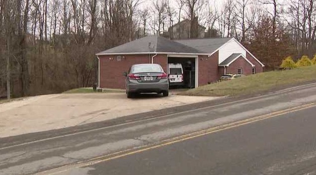 A house coordinator is accused of stealing nearly $15