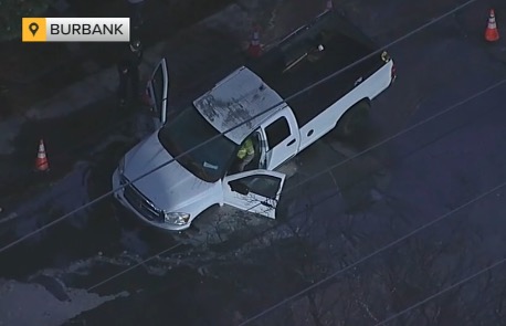 Crews worked to repair a stretch of road in Burbank after a water main break buckled the pavement on February 20