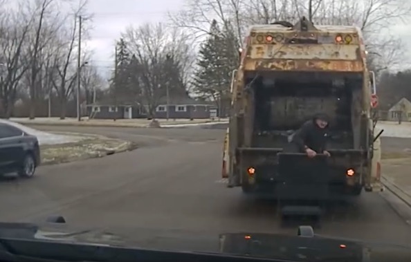 A sanitation worker's shocking discovery while on the job led an Ohio police department to track down a wanted suspect. Video from the Huber Heights Police Department shows the moment the suspect was discovered. The department stated officers tried to pull a car over