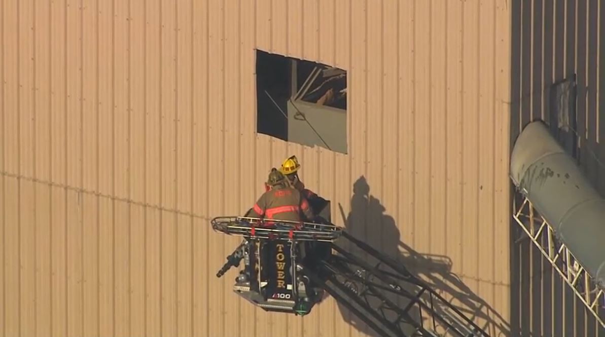 Crews rescued a worker who became trapped in an elevated sand hopper in Cockeysville