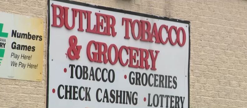 Dramatic video shows the moment a woman ran into a store to evade an ex-boyfriend who was allegedly attempting to kidnap her in Butler County.