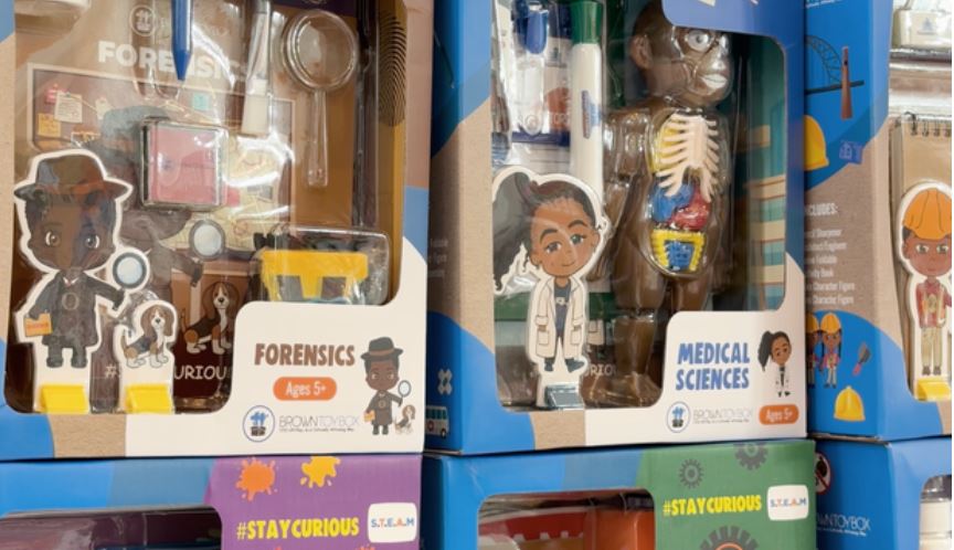 Educational kits showcasing Black and Brown children as coders