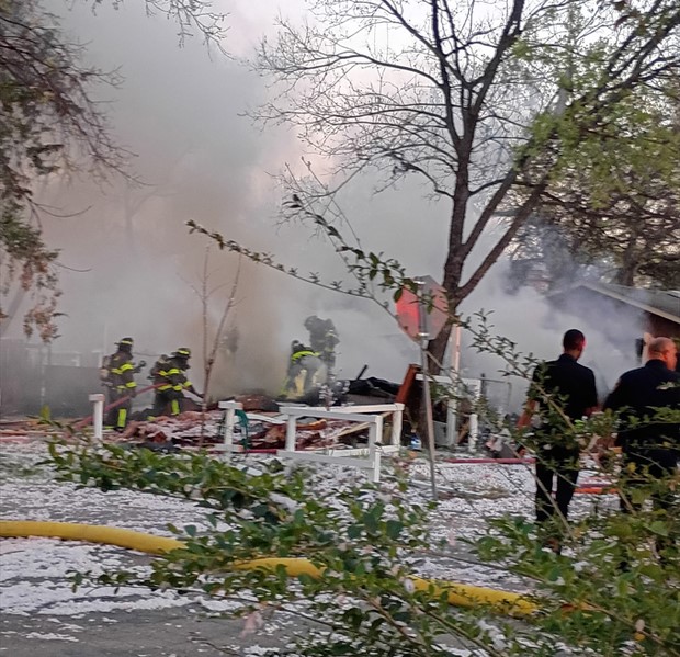 A Lake Dallas neighbor is describing the moments he pulled an injured woman from the wreckage of a home that exploded Thursday night