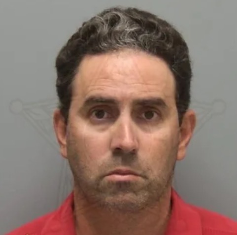 A Florida man has been arrested after police say he threatened a neighbor with a sword during a dispute on Wednesday evening.