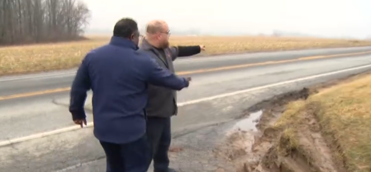 Tire marks along a grass embankment and security video WBAL-TV 11 News obtained from Duvall's Lawn and Garden show just how close two girls