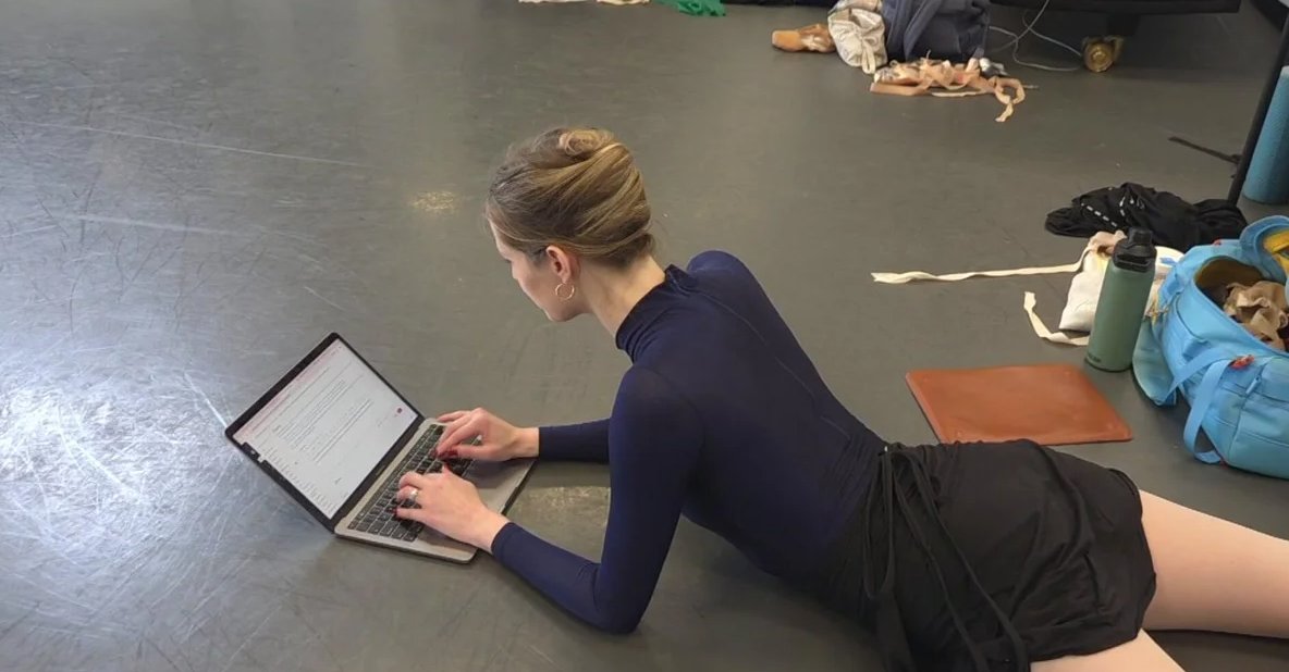 Boston Ballet's Sage Humphries is on her laptop