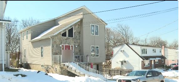 Neighbors of a home displaying hateful symbols in Woodland Park