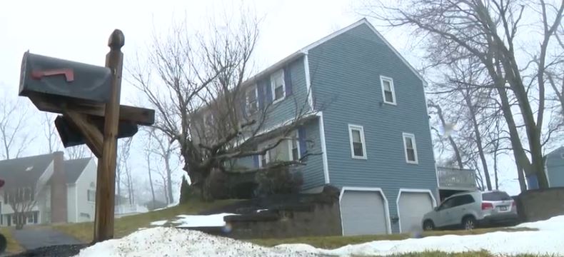 A man is expected to appear in court Tuesday after human remains were found underneath the floor of a garage at a Tyngsborough