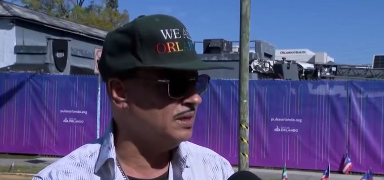 Orlando Torres said he had hoped to watch the removal of the sign by crews hired by the City of Orlando.