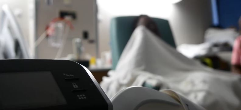 Four days after surviving a shooting that killed his twin brother