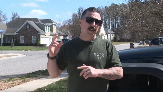 A Suffolk firefighter who was off duty helped stop a house fire from spreading in a Chesapeake neighborhood