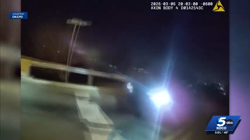 An Oklahoma City police officer hitched a ride on the hood of a stranger's car during a pursuit.