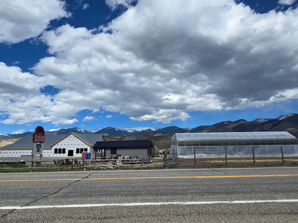 42 volunteers raise the roof at new Baker Country Market after devastating fire