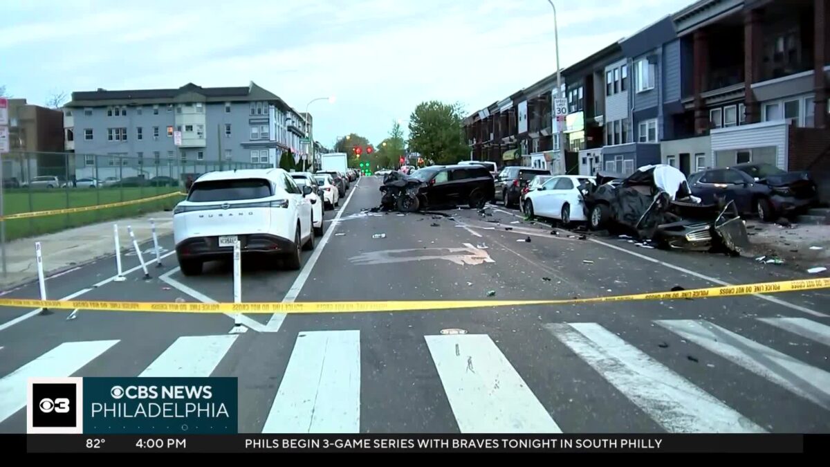 Surveillance video shows the moment of impact in a fatal West Philadelphia crash that killed a driver and a dog Friday morning.