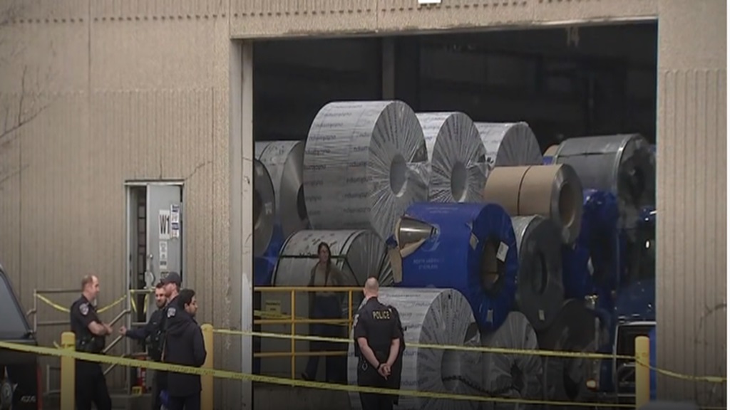 An aluminum spool fell from a crane onto a worker