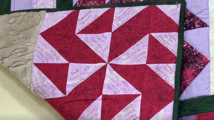 A handmade quilt created by contributors from across the country is now on display in the Treasure Valley