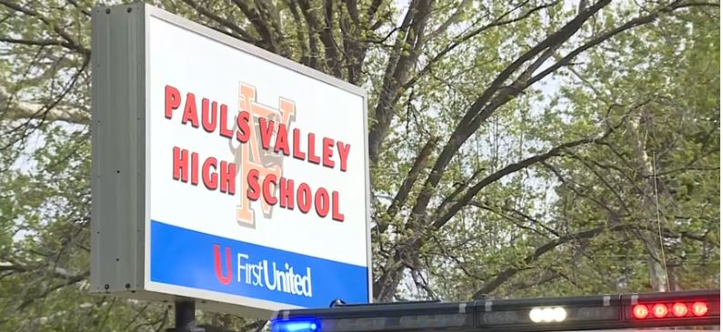 Newly released video shows the moments the Pauls Valley High School principal tackled an armed former student in the school's lobby before being shot last week.