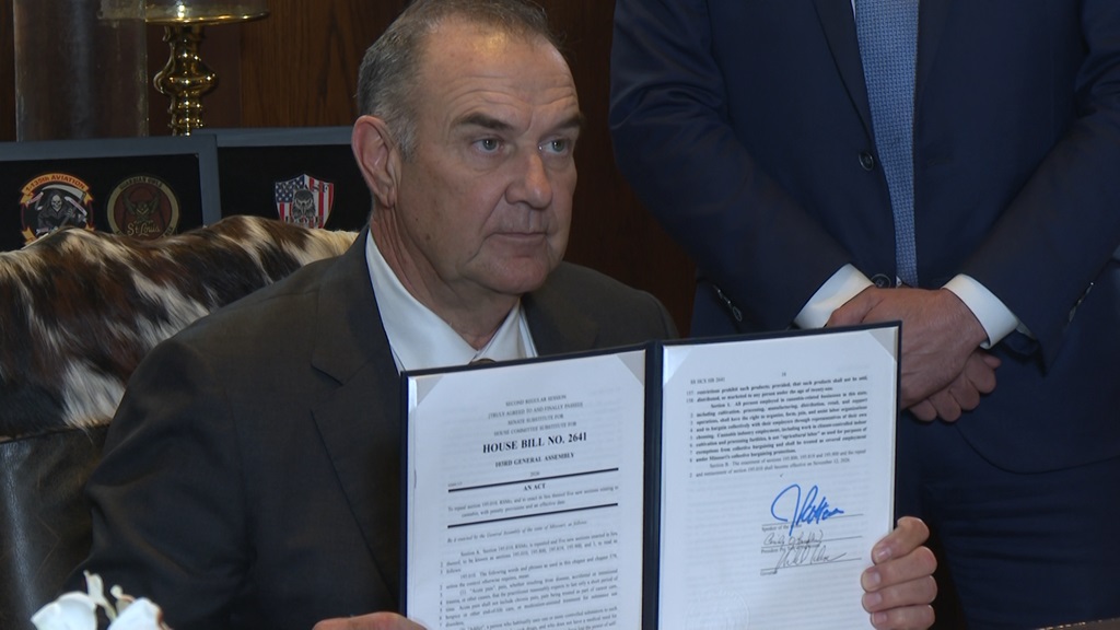 Missouri Gov. Mike Kehoe signs a bill into law that restricts the sale of THC products on April 23