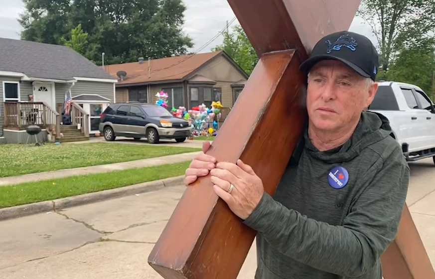 Dan Beazley brought a cross to Shreveport in response to tragic killings.