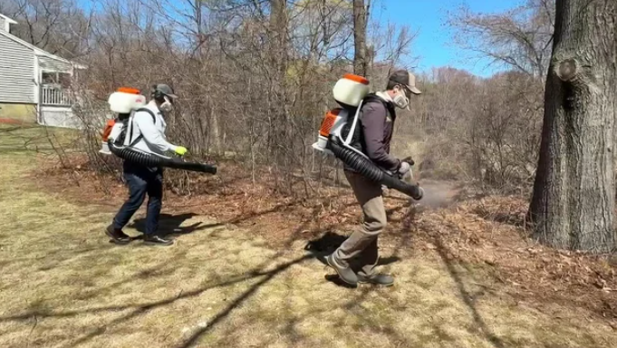 A tick treatment is sprayed at home in Lexington