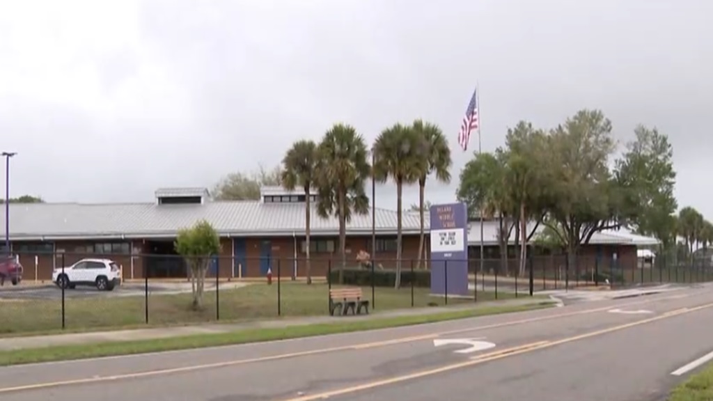 A student accused of photographing a 12-year-old boy with autism inside a school bathroom was suspended for three days