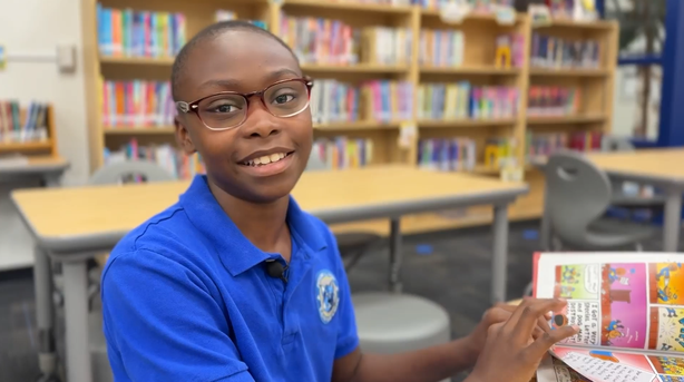 Maxwell Mills received a free eye exam and a pair of glasses during an event at his school.