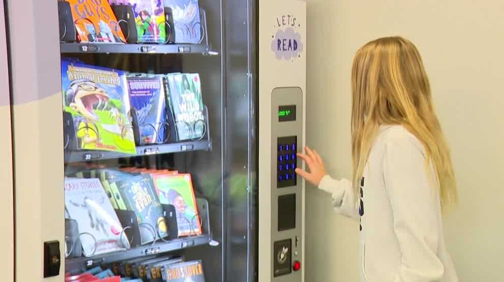 Waukee Community Schools Foundation gifts Shuler and Waukee Elementary Schools grants to install book vending machines aimed at encouraging reading among students.