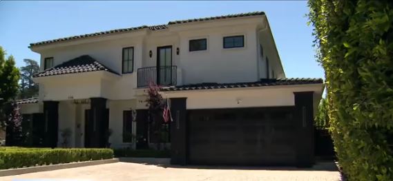 Security cameras showed the moment three masked suspects crept through the backyard of a La Cañada home before forcing their way inside.