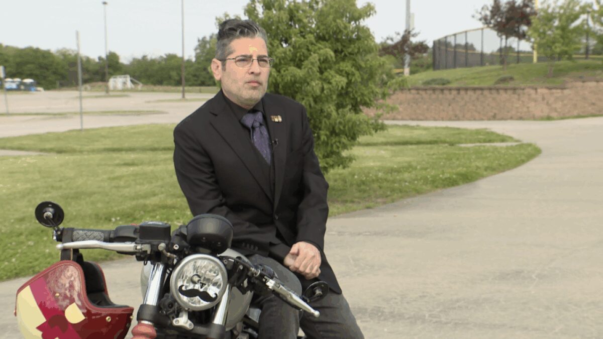 Leather jackets are traded for ties and suits as riders roll through downtown Kansas City.