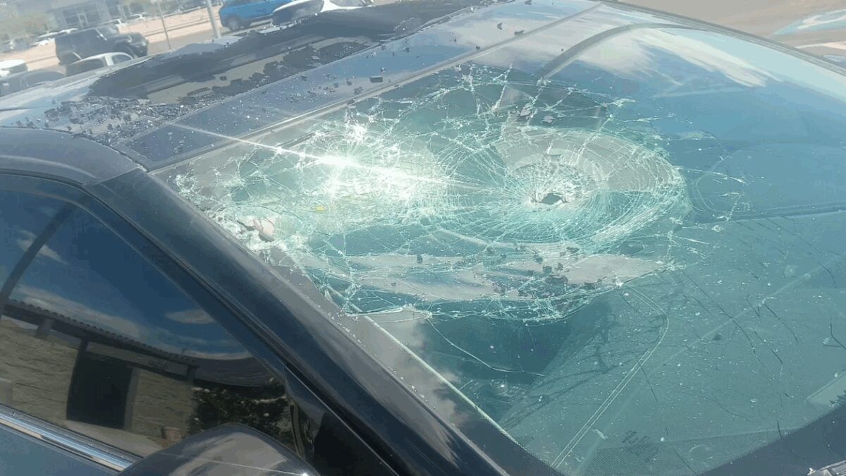 A Las Vegas mother of four says she’s struggling to afford a $500 insurance deductible after a large inflatable display from a southwest valley smog shop allegedly slammed into her car during strong winds.