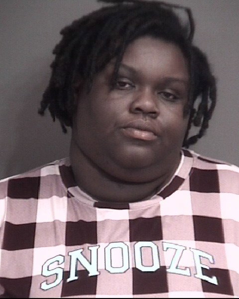 Charges filed against woman accused in Claudell Lane stabbing