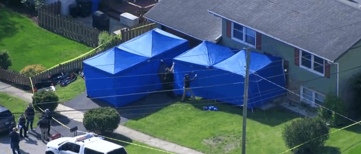 A law enforcement excavation is underway at a home as police look for the remains of Kianna Galvin.