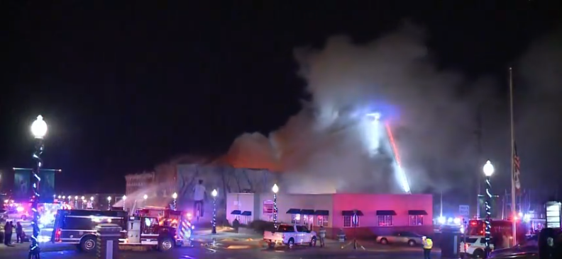 Community rallies to open Mulholland's Grocery store after a building was destroyed in a 2021 fire.