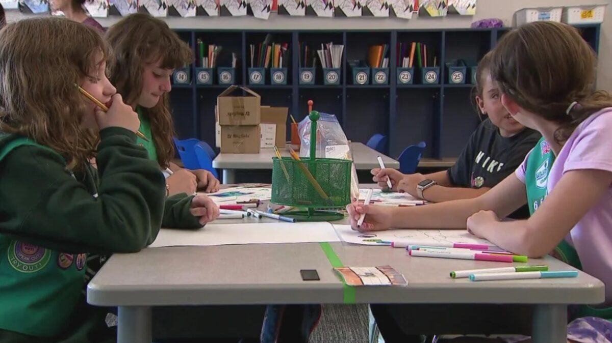 A Girl Scout troop in Colorado is tackling conflict resolution with a project designed to help classmates settle arguments on their own.