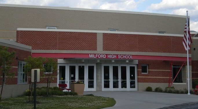A volunteer organization's last-minute fundraising push ensured no Milford High School senior would have to sit out graduation over an unpaid bill.