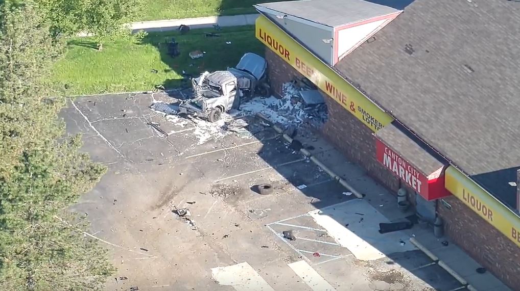 A local father has died after the Canton Police Department says he crashed a truck into a building while taking his teenage son to school Wednesday morning. The teen was also injured