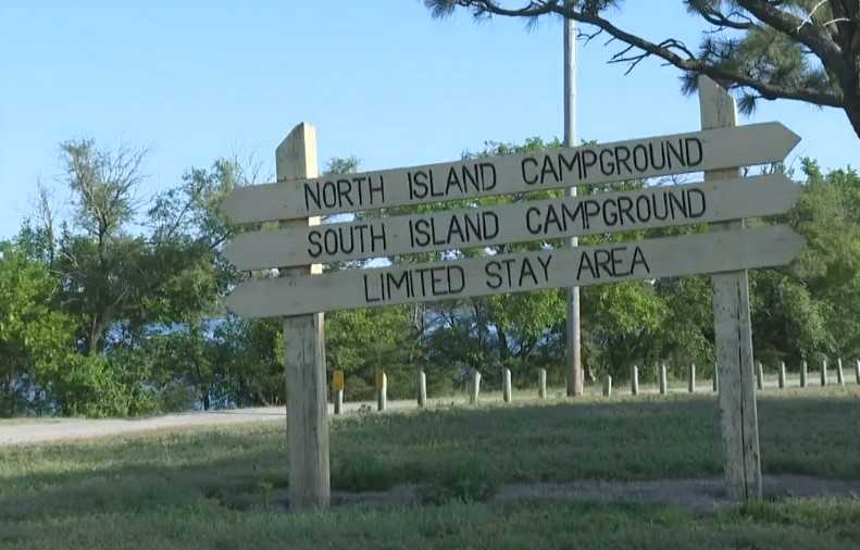 Authorities have arrested a 66-year-old man in connection with the death of his girlfriend at a Lake Afton campground on Friday.