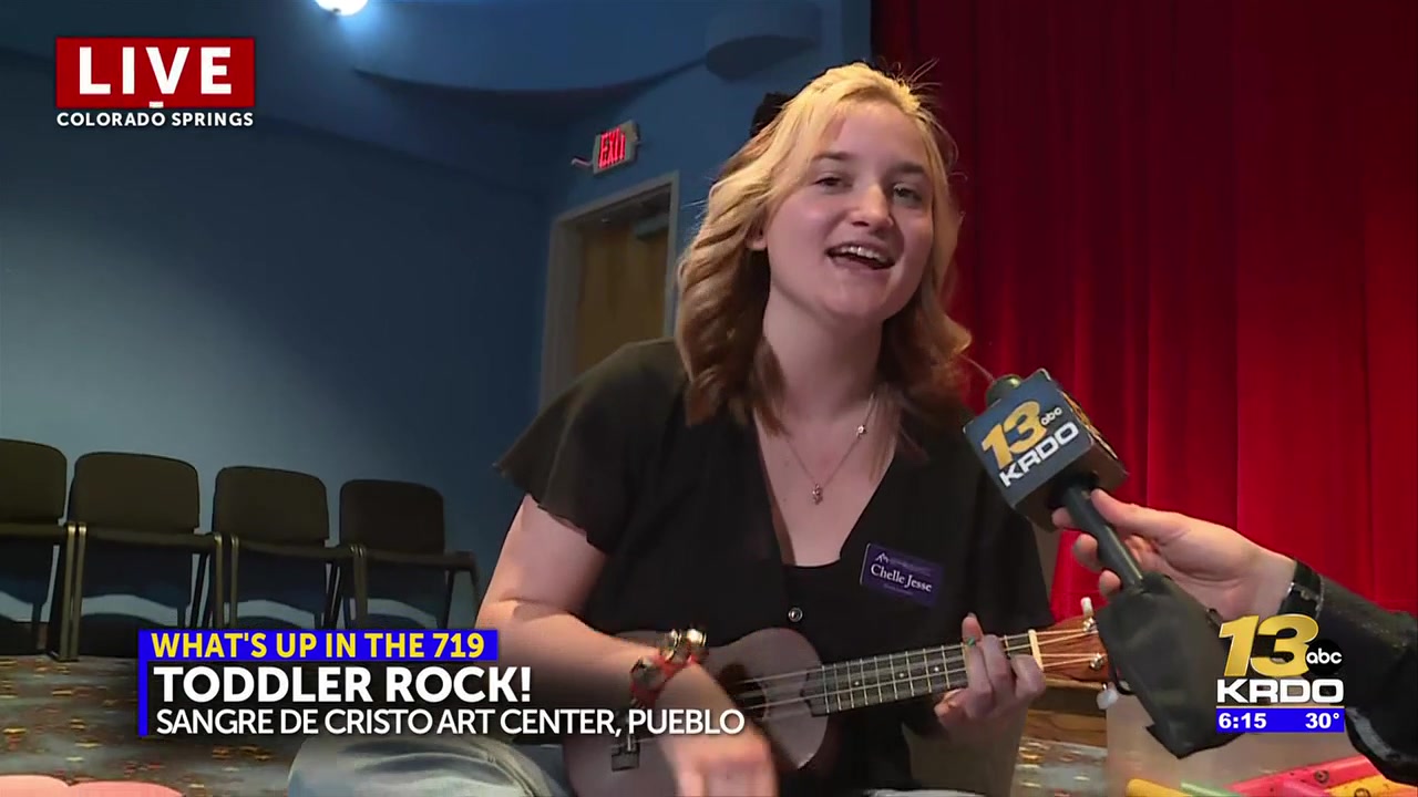 Local mucisian teaching “rock” music to toddlers