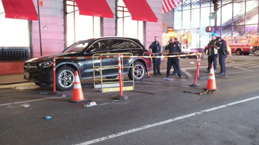 A woman died after plunging down an open manhole in Midtown Manhattan moments after stepping out of her car on May 18.