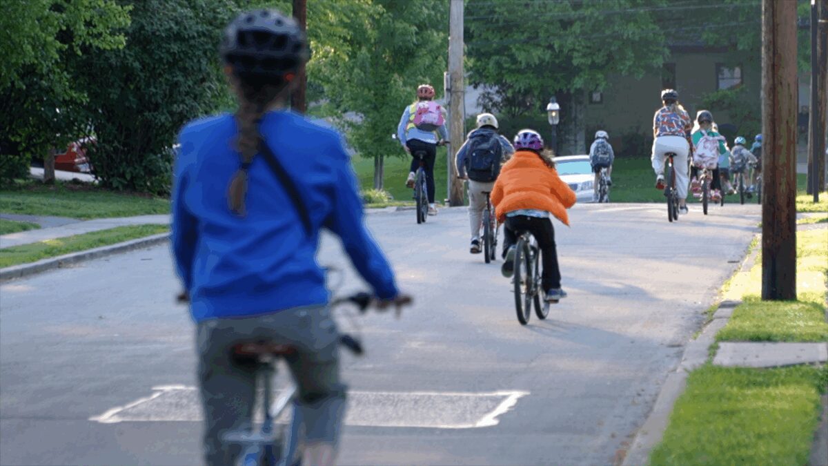 Parents and students from Pleasant Ridge Montessori get together on Friday mornings and ride their bikes to school.